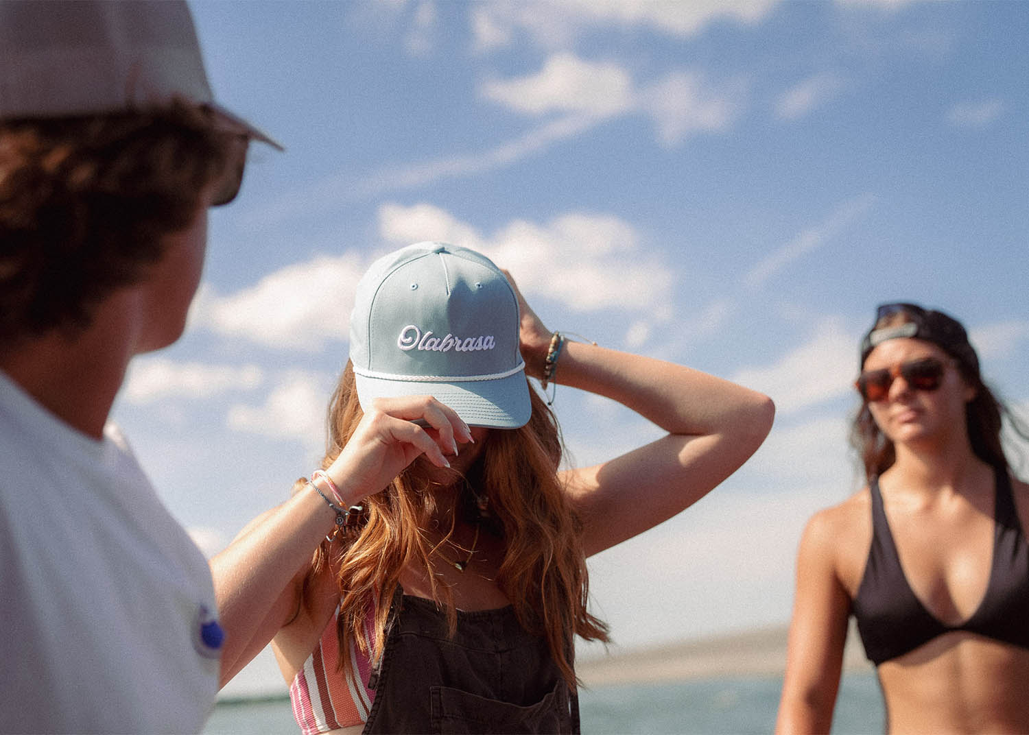 Young woman wearing an Olabrasa Rope Hat enjoying a sunny day.