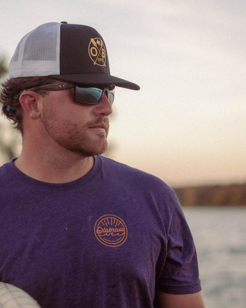 Man on boat wearing Olabrasa merch