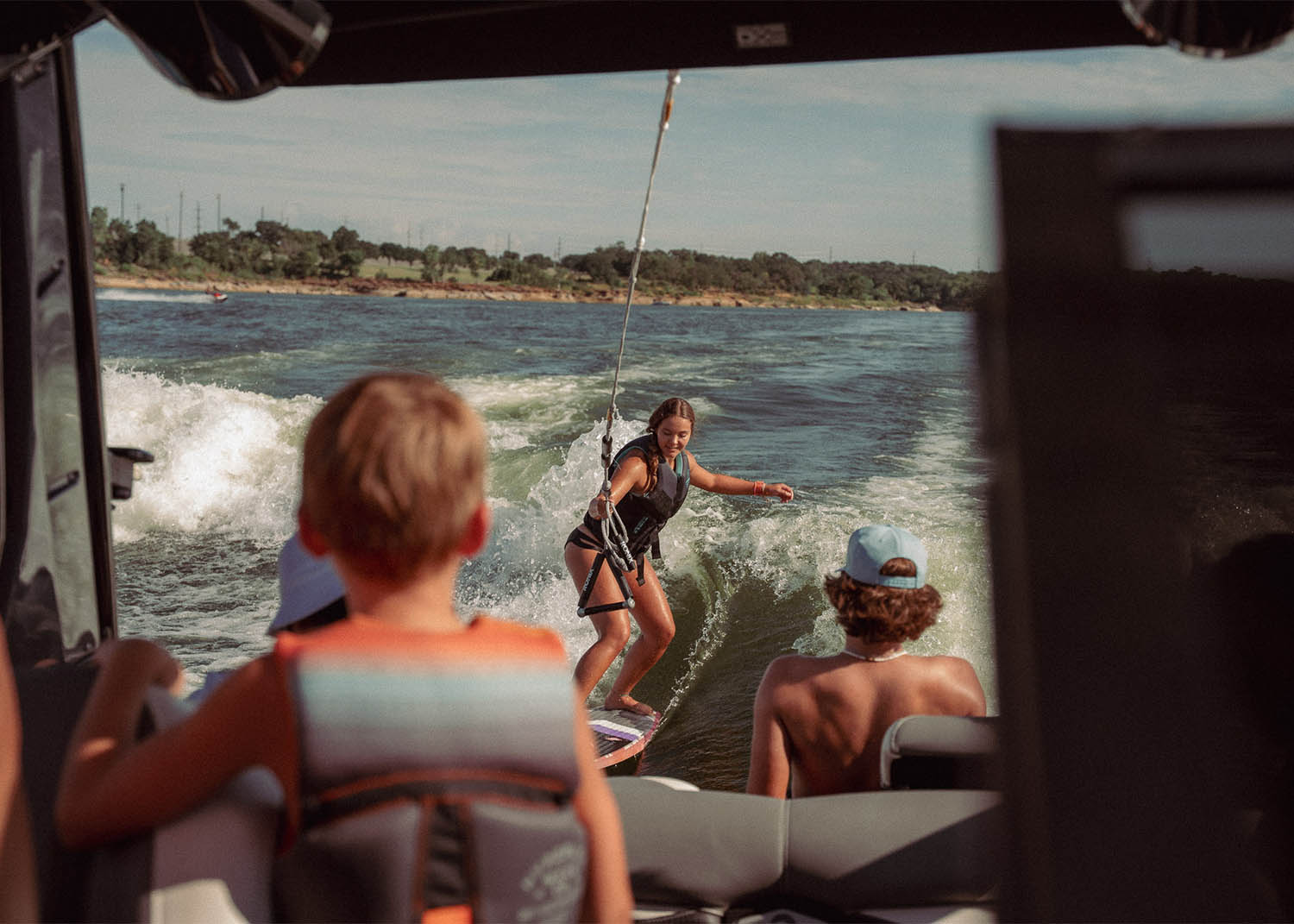 Person surfing behind a boat.