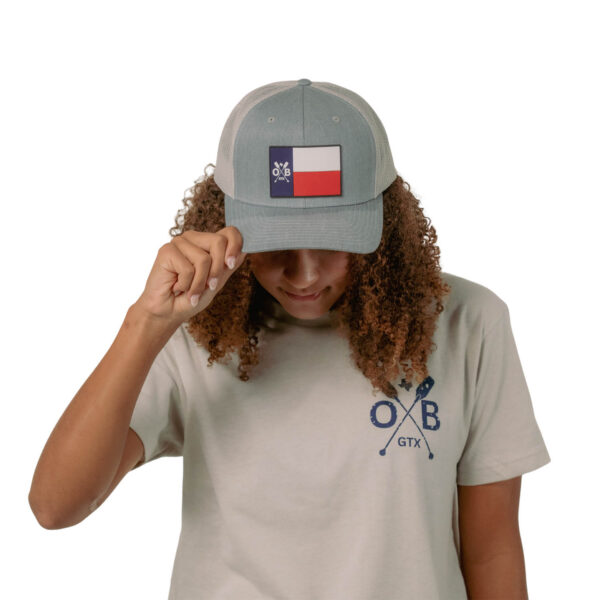 Model wearing Olabrasa Texas Forever Flat SnapBack Hat