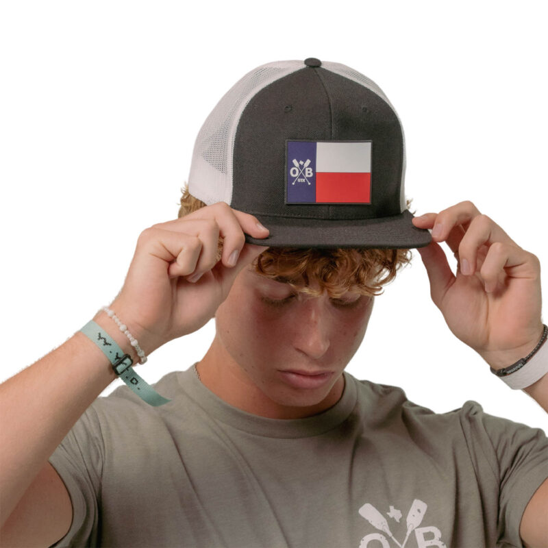 Model wearing Olabrasa Texas Forever Flat SnapBack Hat