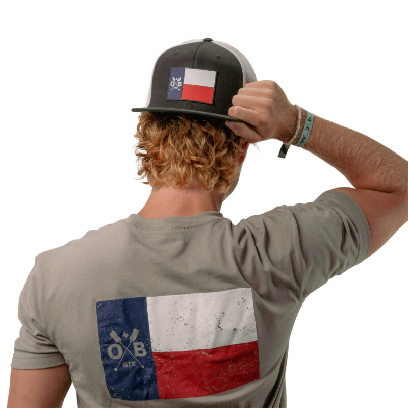Model wearing Olabrasa Texas Forever Flat SnapBack Hat