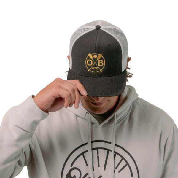 Model wearing Olabrasa Paddle Curved SnapBack Hat