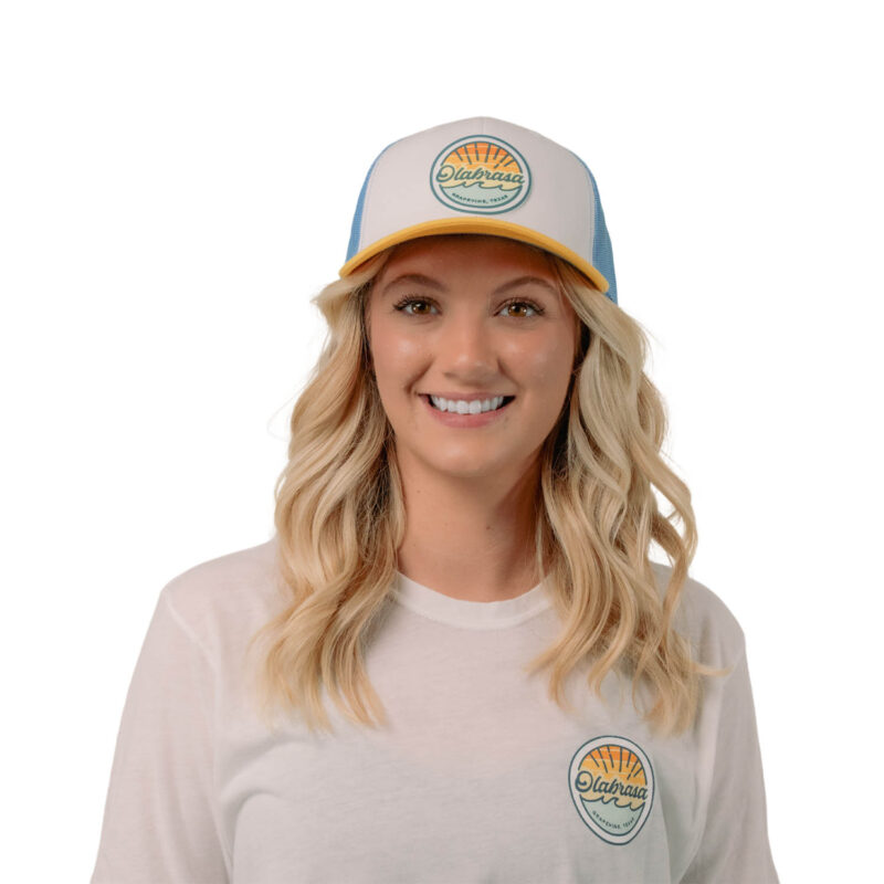 Model wearing Olabrasa OG Curved SnapBack Hat