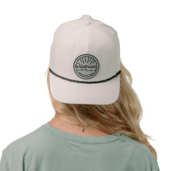 Model wearing Olabrasa OG Rope SnapBack Hat
