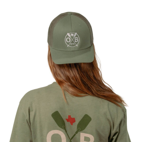 Model wearing Olabrasa SnapBack Curved Hat
