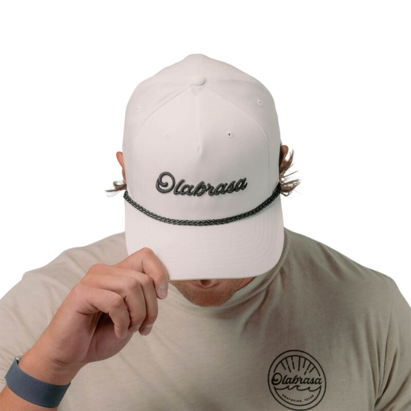 Model wearing Olabrasa Rope Script Hat